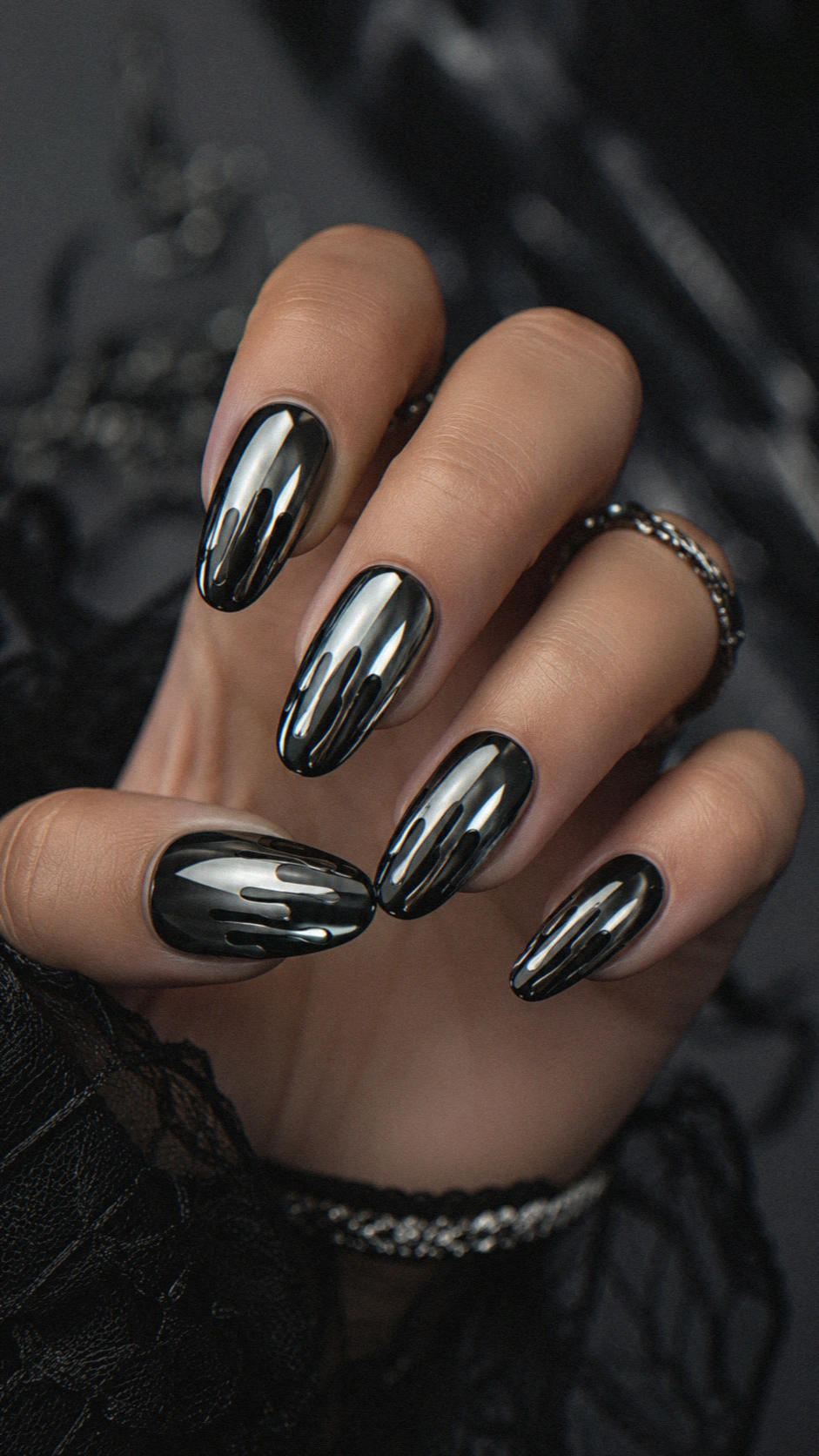 black chrome dripping halloween nails