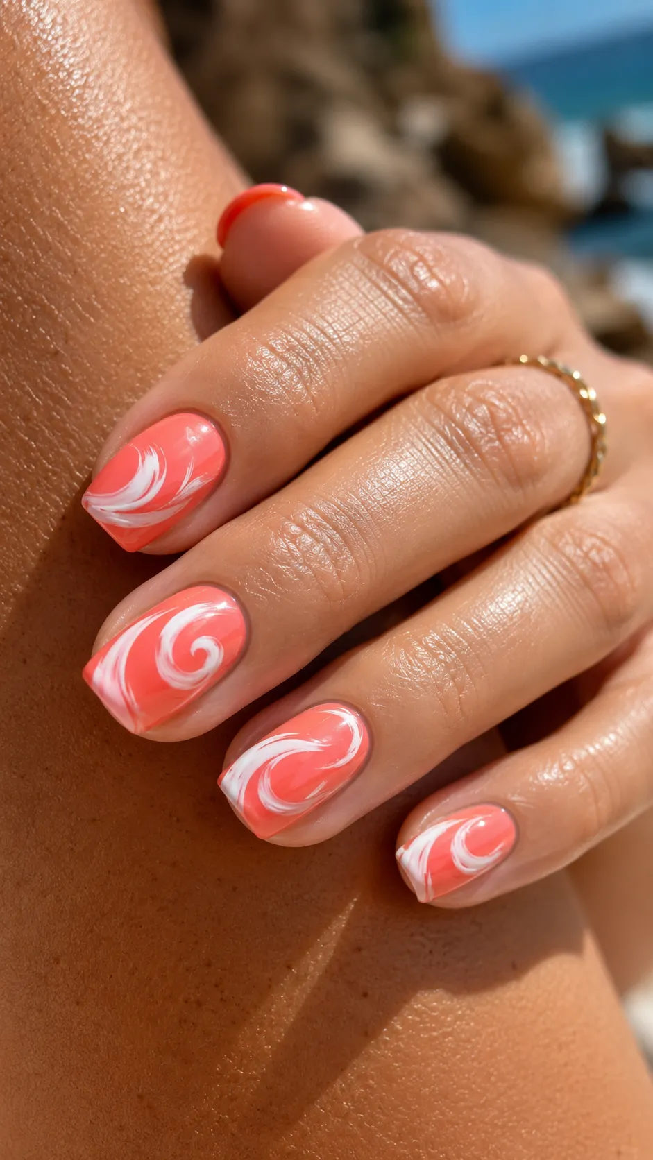 coral swirl statement nail design