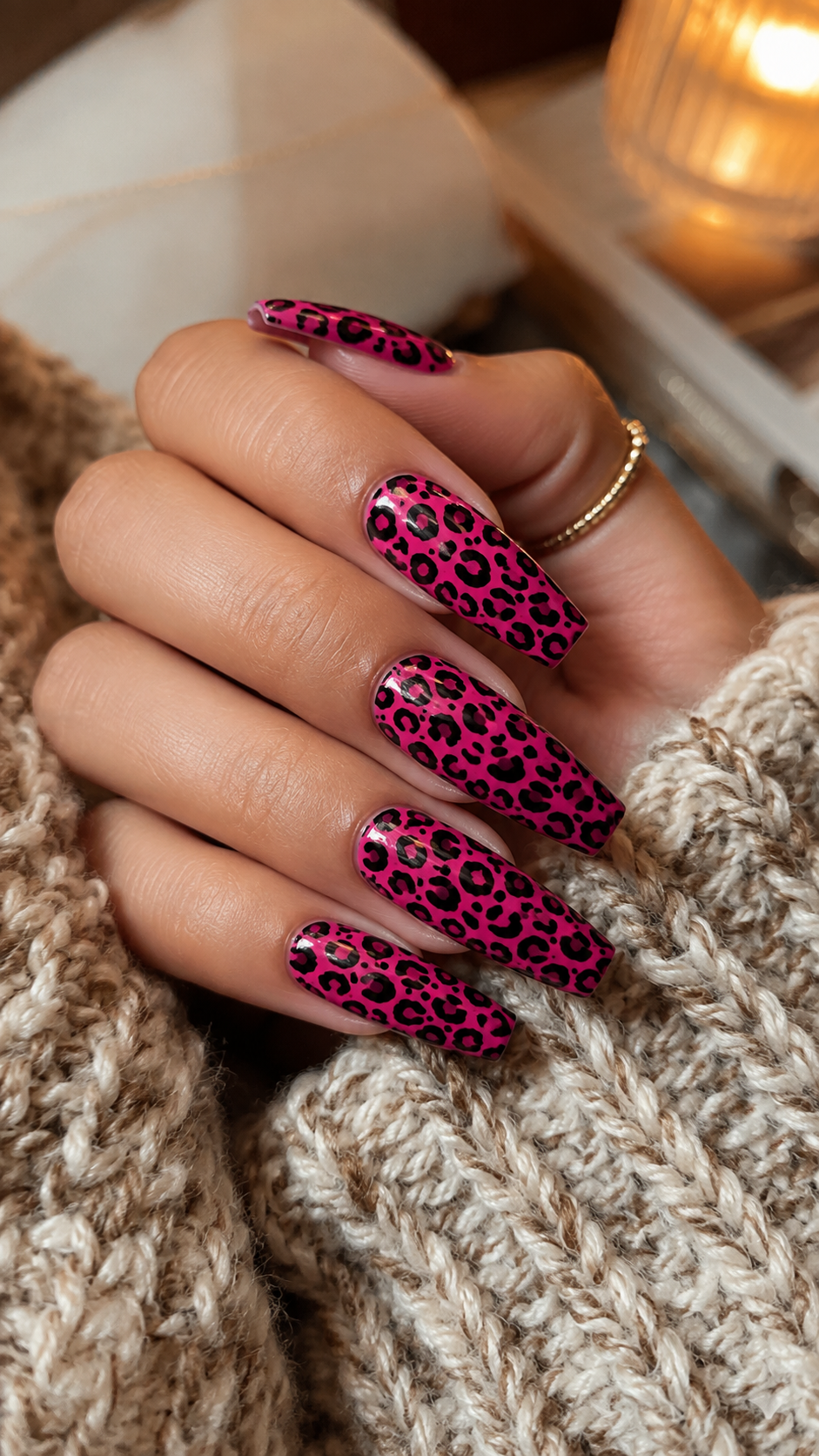 Hot pink leopard print nail art design, bold manicure inspo.