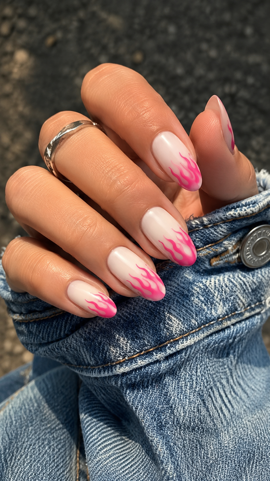Hot pink flame nail art design, edgy Y2K manicure inspo.